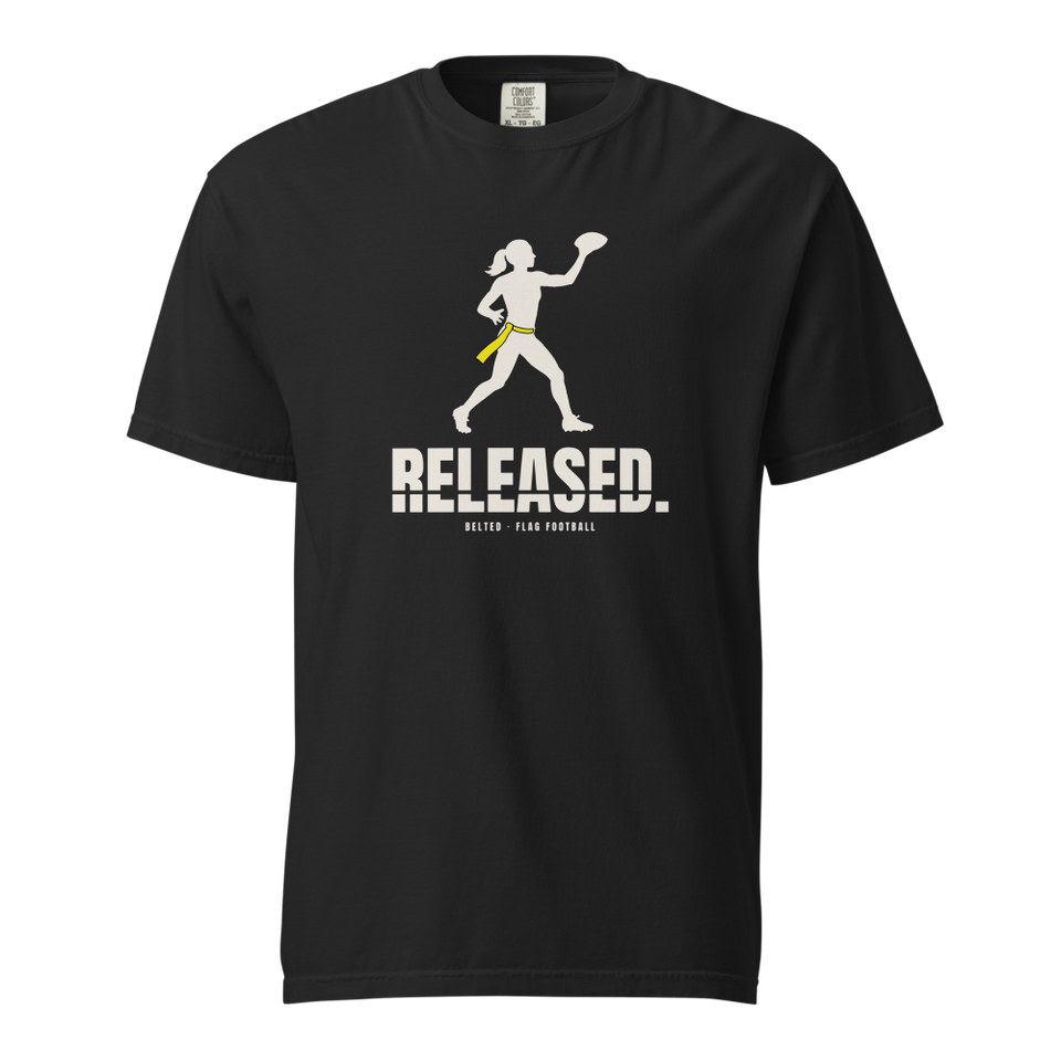 Released Tee in black, front view: Ivory quarterback silhouette with yellow belt above RELEASED. and Belted Flag Football